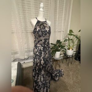 Betsy and Adam navy blue and gold crinkle gown.